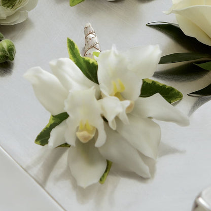 White Mini Cymbidium Boutonniere –  Indio Florist, Indio CA